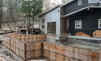 Prepared site with foundation forms for home remodeling and addition project in Duluth, MN